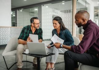 Leaders discussing strategies to manage change fatigue in a workplace setting